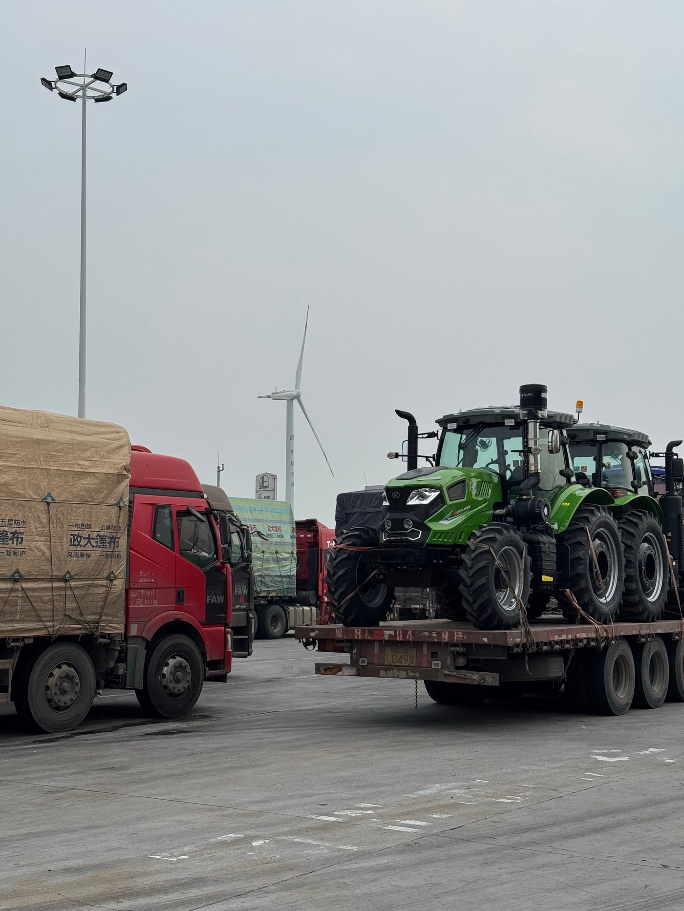 Agricultural tractors on trailer